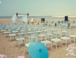 夏季户外浪漫温情沙滩婚礼场景摄影照片