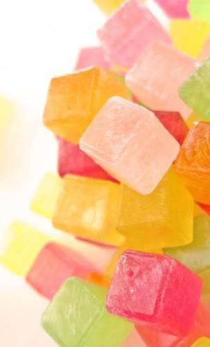 小巧甜蜜的彩虹糖摄影图片