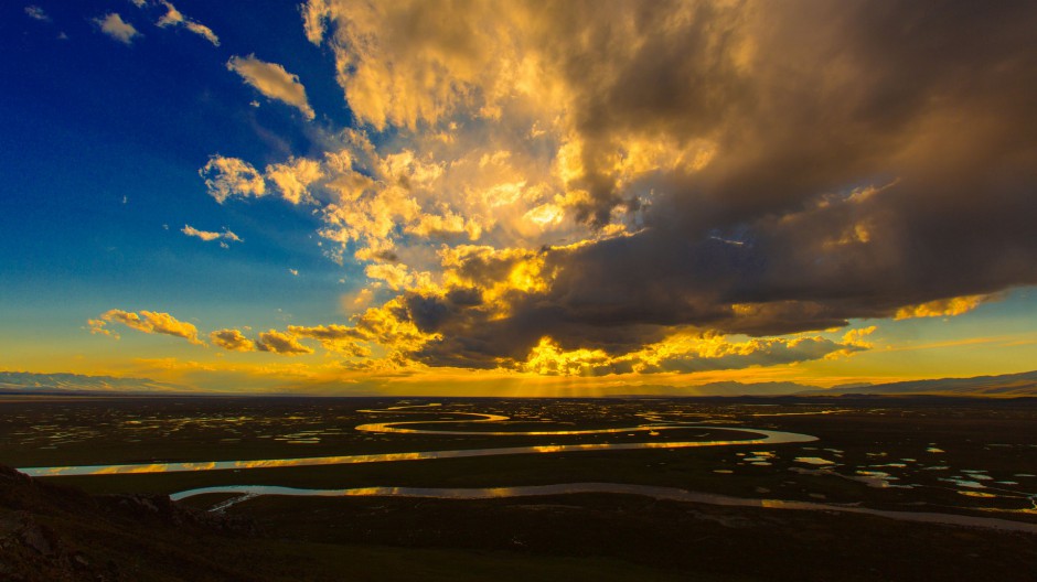 蓝天白云草原夕阳自然风景图片