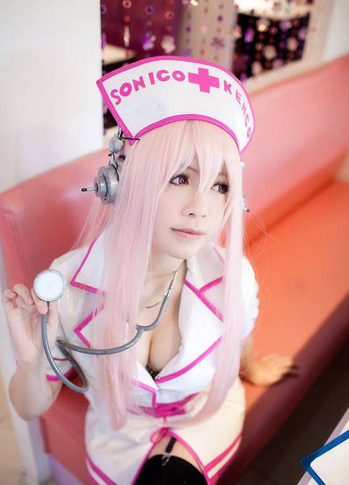 台湾美眉迷人粉红护士装COS写真