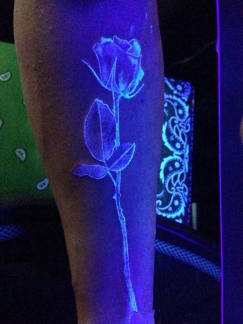时尚创意的手臂荧光隐形纹身图片
