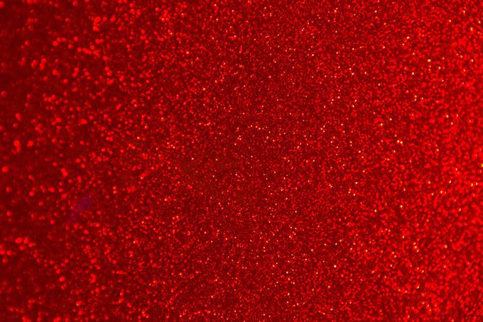 粒子动态流动红色背景图