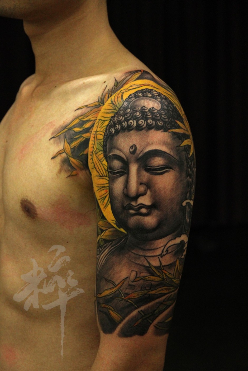 手臂超酷的佛头纹身图案花臂