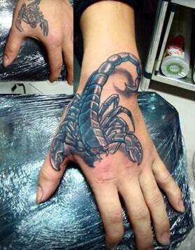 手臂虎口蝎子刺青纹身男生个性纹身图案