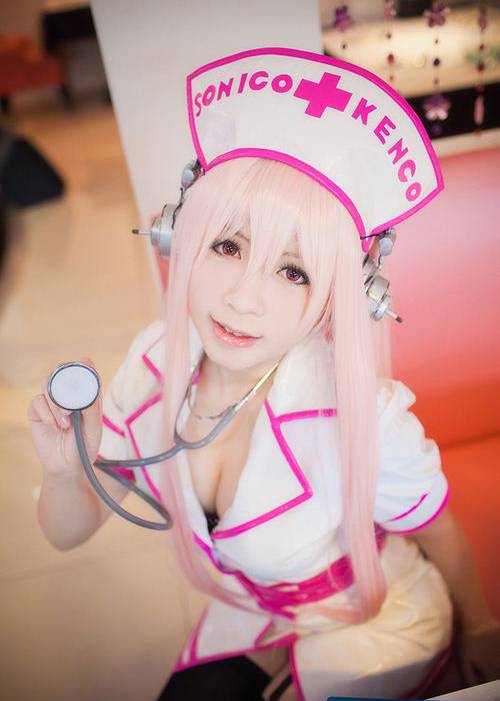 台湾美眉迷人粉红护士装COS写真