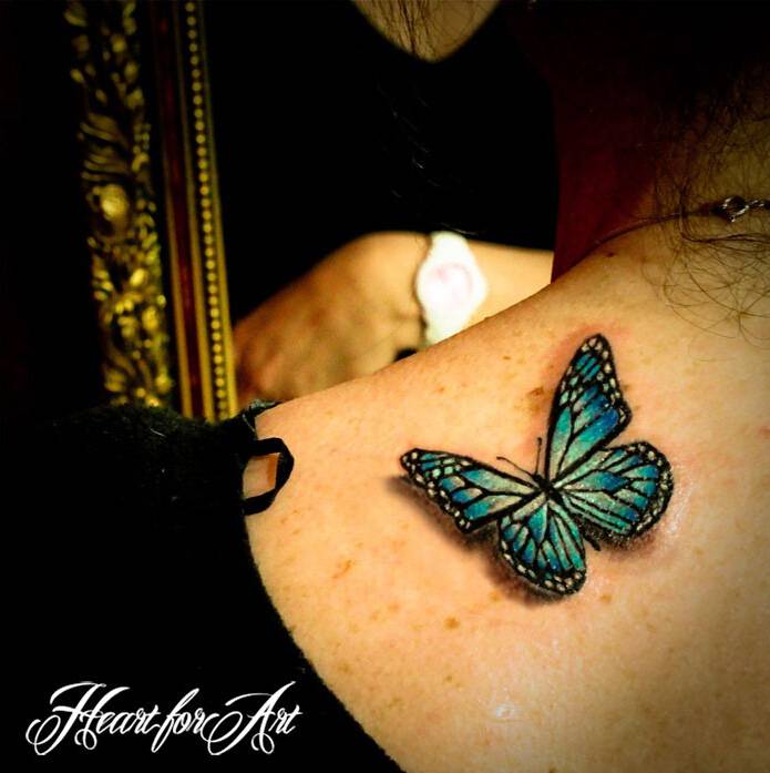 美女身上的美丽蝴蝶3d纹身