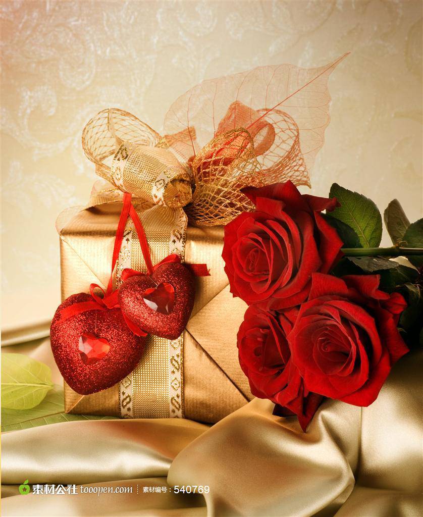 浪漫艳红玫瑰与金色礼盒图片