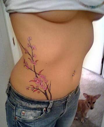 女生腰部艺术纹身图案大全