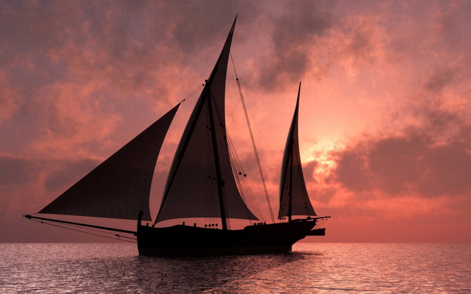 夕阳下的大海帆船高清壁纸