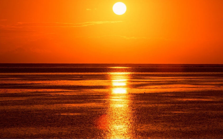 唯美海边红色日出美景图片