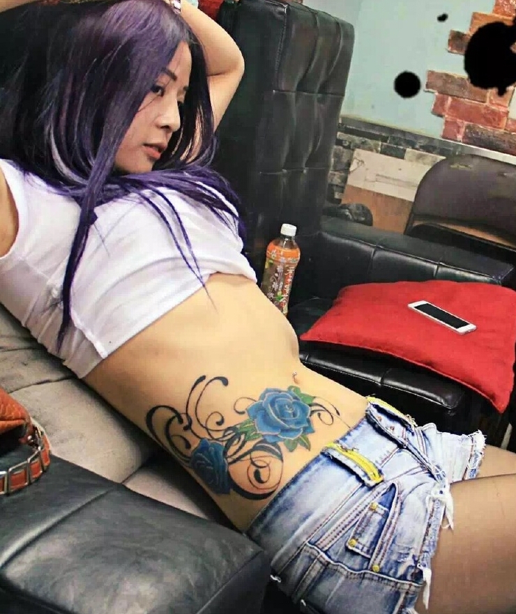 女生纹罂粟花纹身图案 个性女生腰部花纹纹身图片