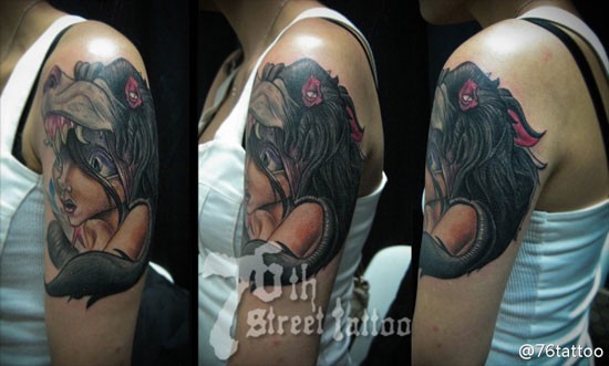 女人手臂可爱前卫的卡通美女纹身图片