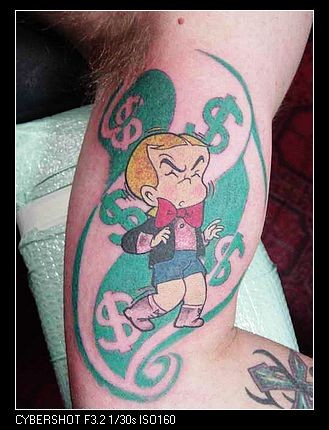 手臂内侧可爱的卡通人物纹身图片