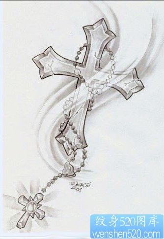 一张时尚精美的十字架纹身图片