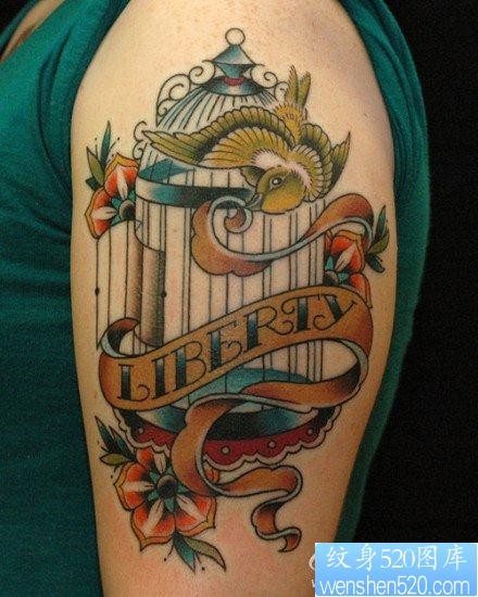 手臂一张欧美风格的小鸟与鸟笼纹身图片