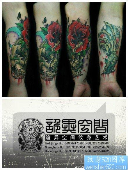手臂流行很酷的玫瑰花鬼爪纹身图片