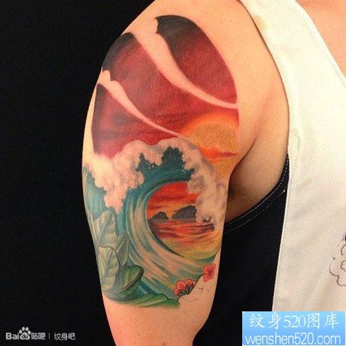 手臂精美好看的彩色浪花纹身图片