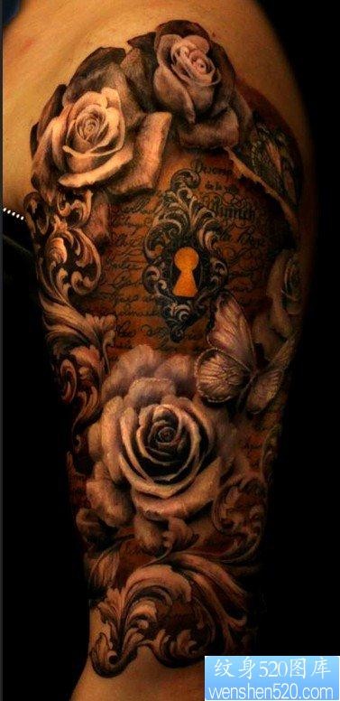 大臂上一张欧美玫瑰花纹身作品