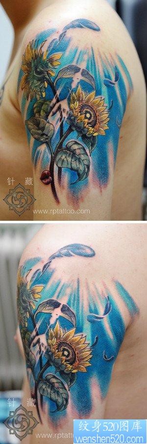 手臂漂亮精美的彩色向日葵花纹身图片