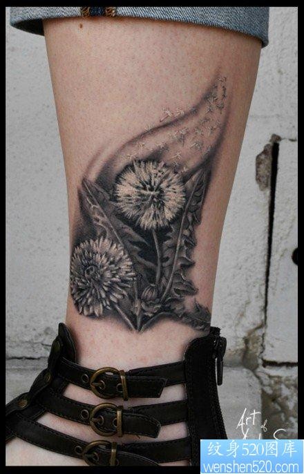 女人小腿前卫流行的蒲公英纹身图片