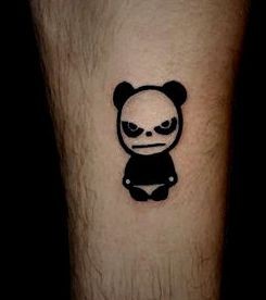 腿部邪恶的图腾小熊猫纹身图片