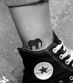 流行时尚的腿部图腾大象纹身图片
