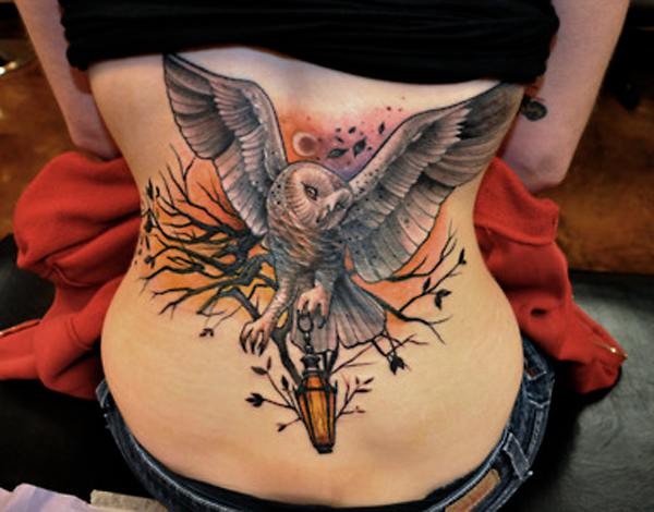 美女腰部很酷流行的猫头鹰纹身图片