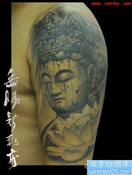 手臂流行经典的石雕虚空藏菩萨纹身图片