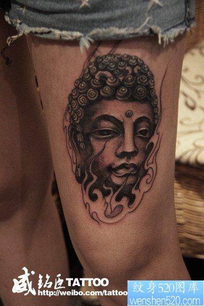 美女腿部经典前卫的佛头纹身图片