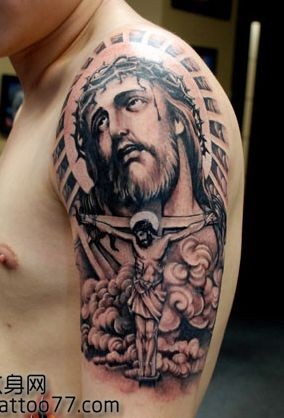 大臂耶稣头像纹身图片