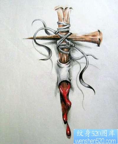 一张流行漂亮的滴血十字架纹身图片图案