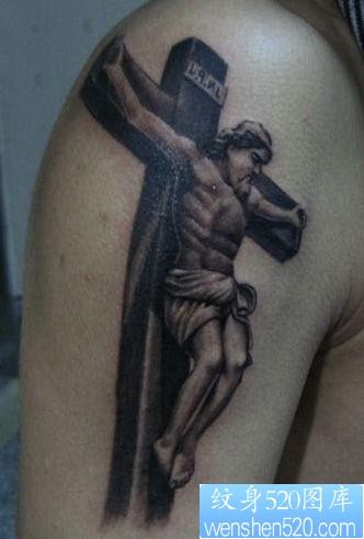 手臂一张十字架耶稣纹身图片