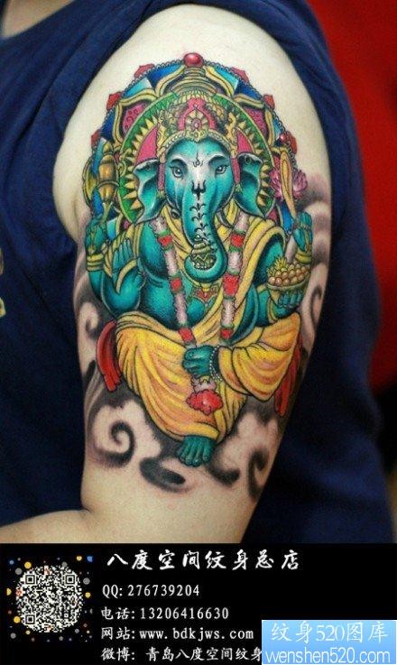 手臂流行很酷的传统彩色象神纹身图片
