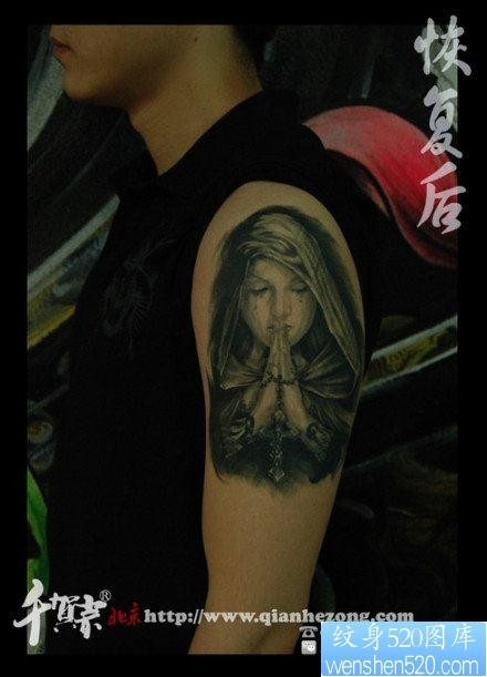 手臂一张经典流行的圣母纹身图片