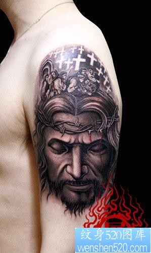 大臂经典前卫色耶稣肖像纹身图片