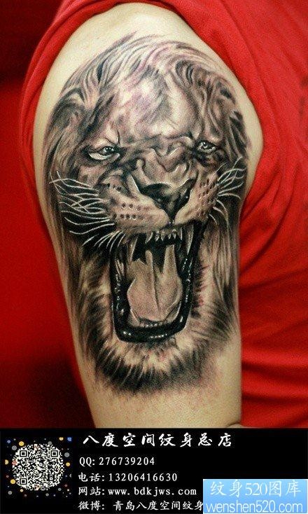 男生手臂霸气超帅的狮头纹身图片