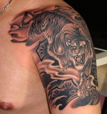 老虎纹身图片：手臂下山虎纹身图片纹身作品