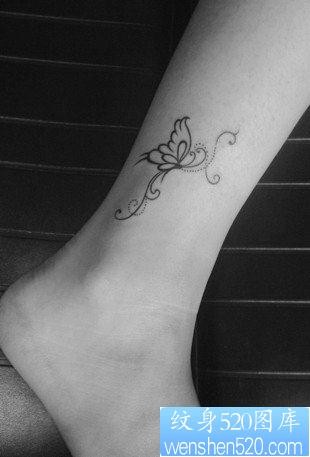 女孩子腿部流行精美的图腾蝴蝶纹身图片