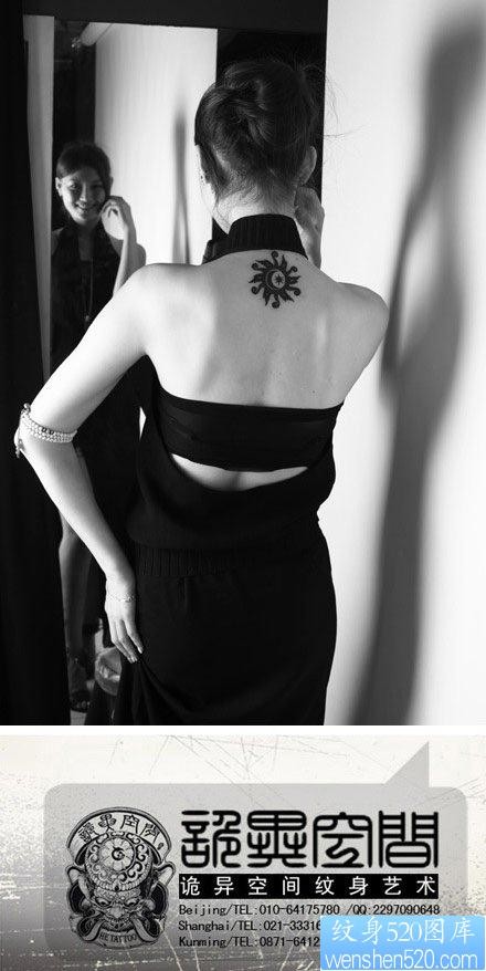 女人后颈部时尚经典的图腾太阳纹身图片