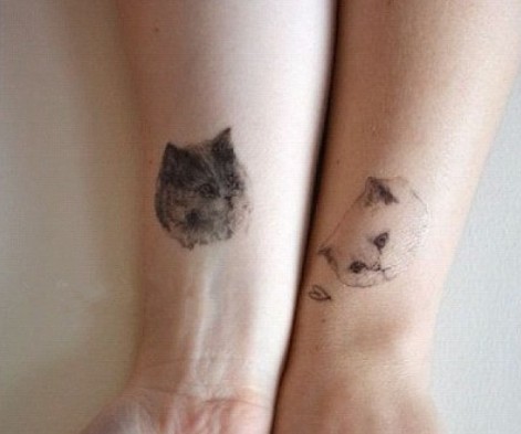 情侣手臂黑猫白猫刺青