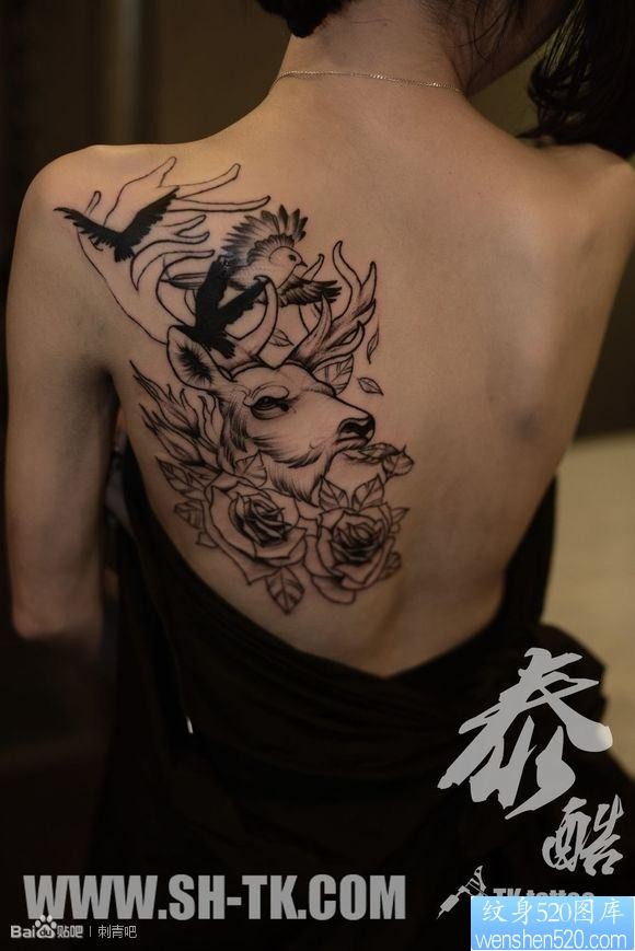 背部独角兽大雁玫瑰花纹身图片
