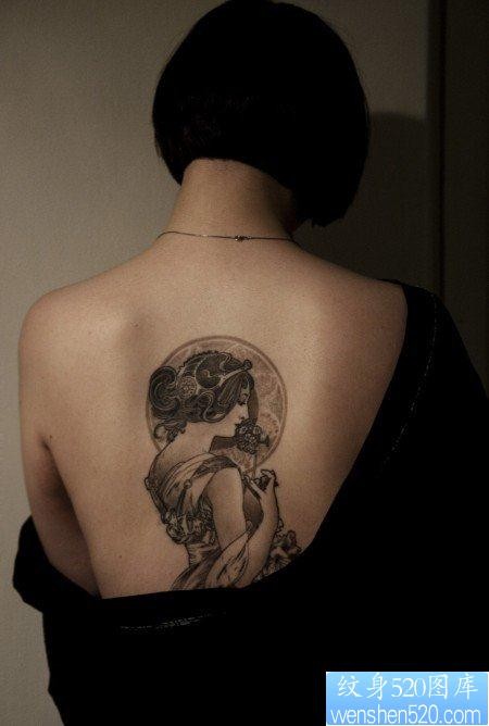 纹身520图库推荐一幅女人背部文身图片