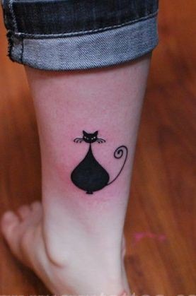女孩子腿部流行的图腾猫咪纹身图片