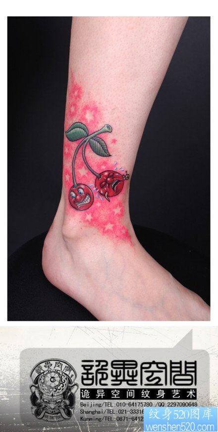 女人腿部经典的一幅哭笑的樱桃纹身图片