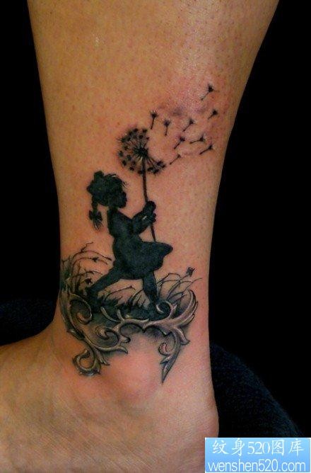 腿部一幅潮流经典的吹蒲公英的女孩子纹身图片
