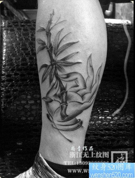 腿部时尚经典的一幅佛手与竹子纹身图片