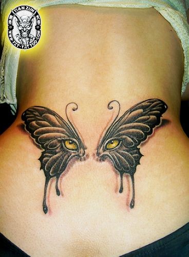 美女腰部精美潮流的蝴蝶翅膀纹身图片
