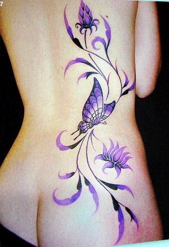 美女腰部精美潮流的蝴蝶翅膀纹身图片