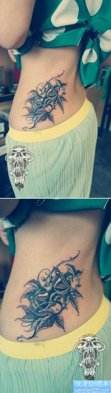 女人腰部一幅唯美时尚的沙漏纹身图片