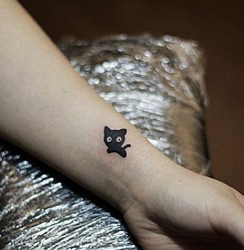 手臂纹身图片：手臂可爱图腾猫咪纹身图片纹身作品